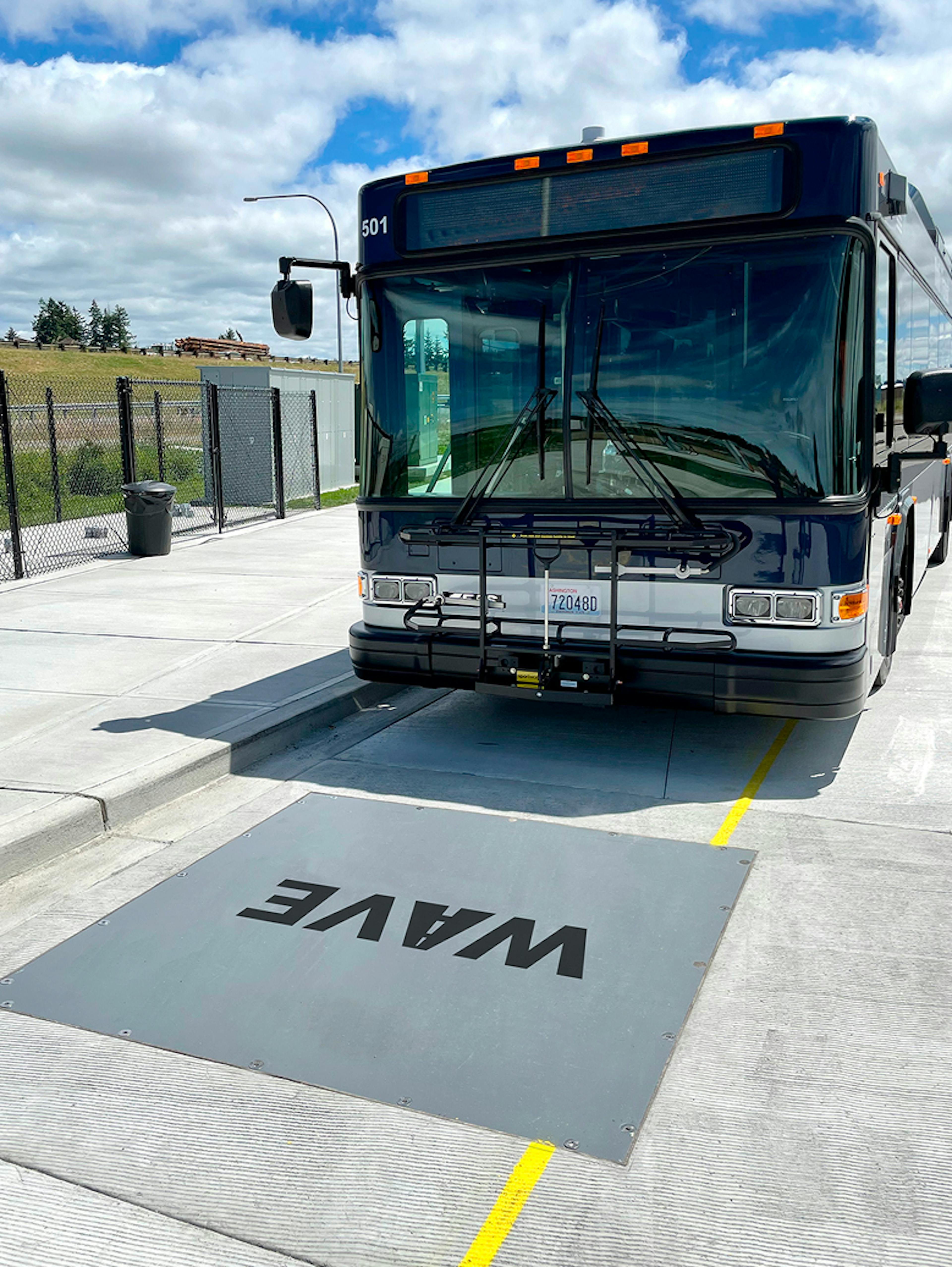 Transit bus and wireless charging pad