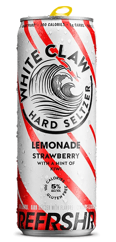 A can of White Claw® REFRSHR™ Lemonade Strawberry sits on rocks in front of the sea.