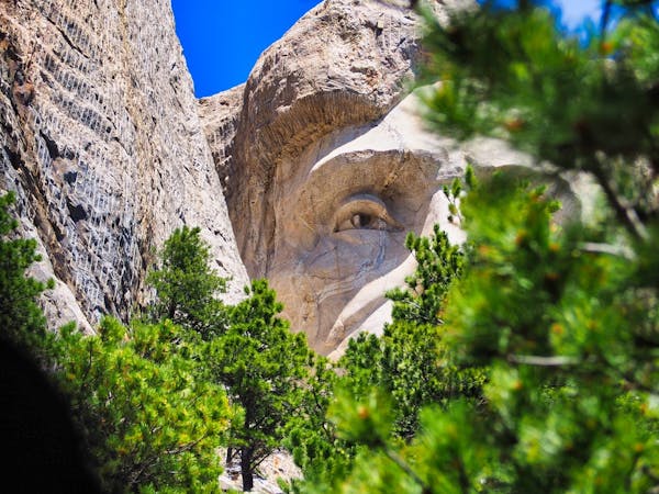 Mt Rushmore - Lincoln peaking through the trees