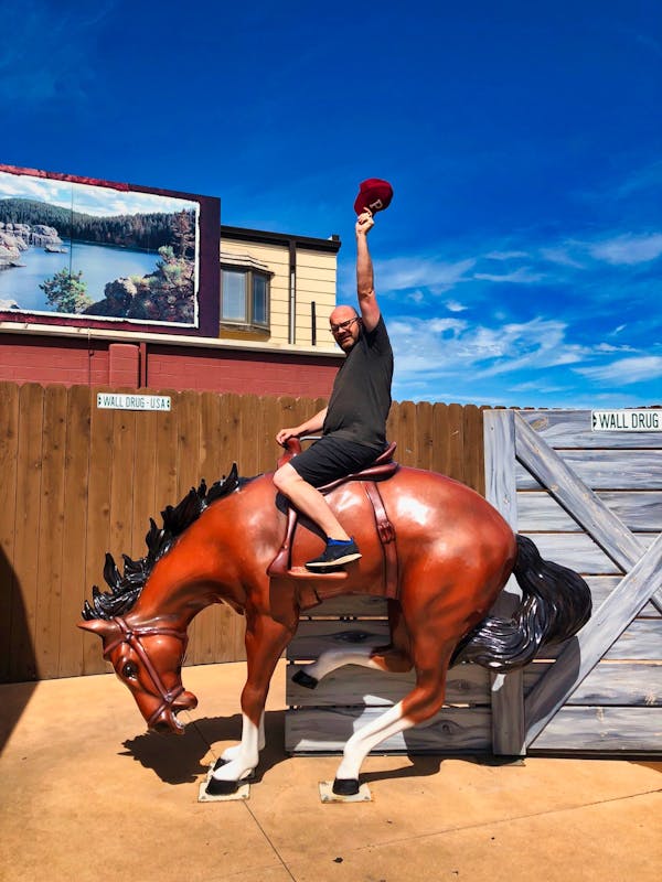 Jon riding a Bronco