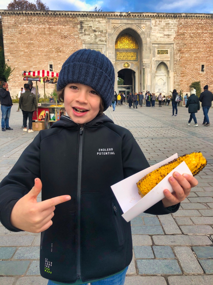 Harry with his roasted corn on the cob 