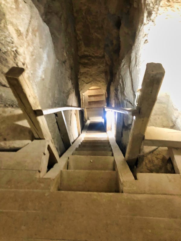 view of the bottom of the entrance tunnel to the first staircase