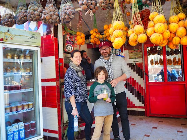 Laura, Jon, and H stopping for some sugar cane juice