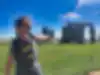 H pretty shocked by Stonehenge behind him