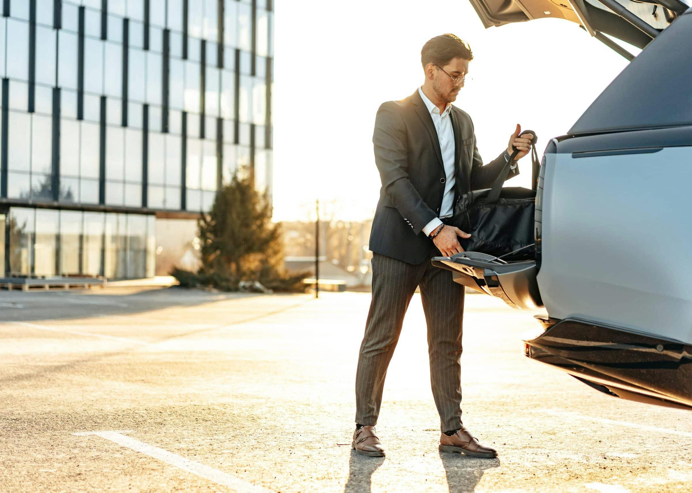 A high earning individual all packed up leaving from his high earning job