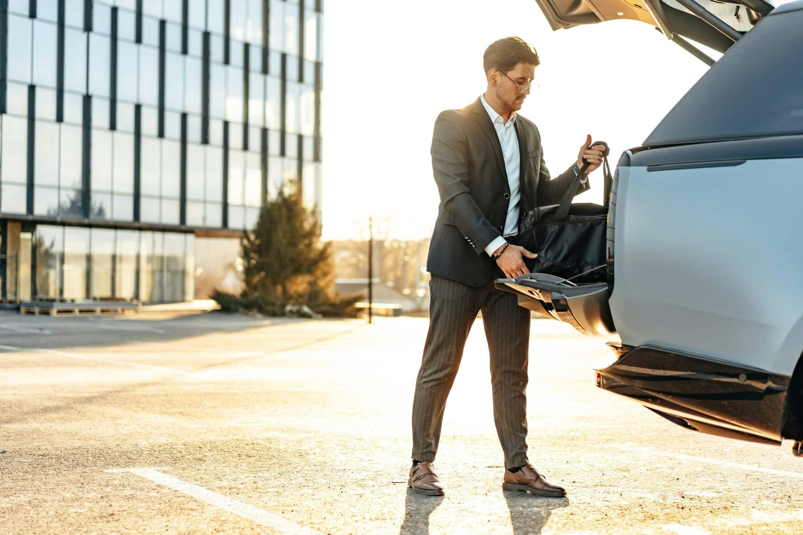 A high earning individual all packed up leaving from his high earning job