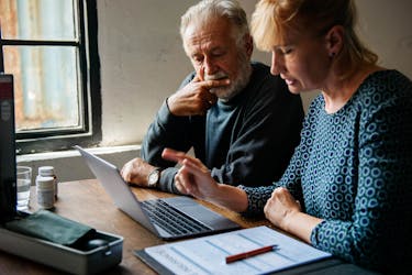 Couple reviewing real estate investments