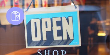 Open sign in the window of a shop