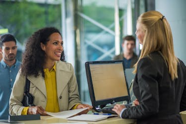 Credit union teller with great customer service and great interest rates.