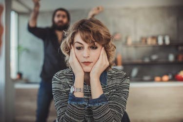 Man and woman recently married fighting over a large amount of college debt