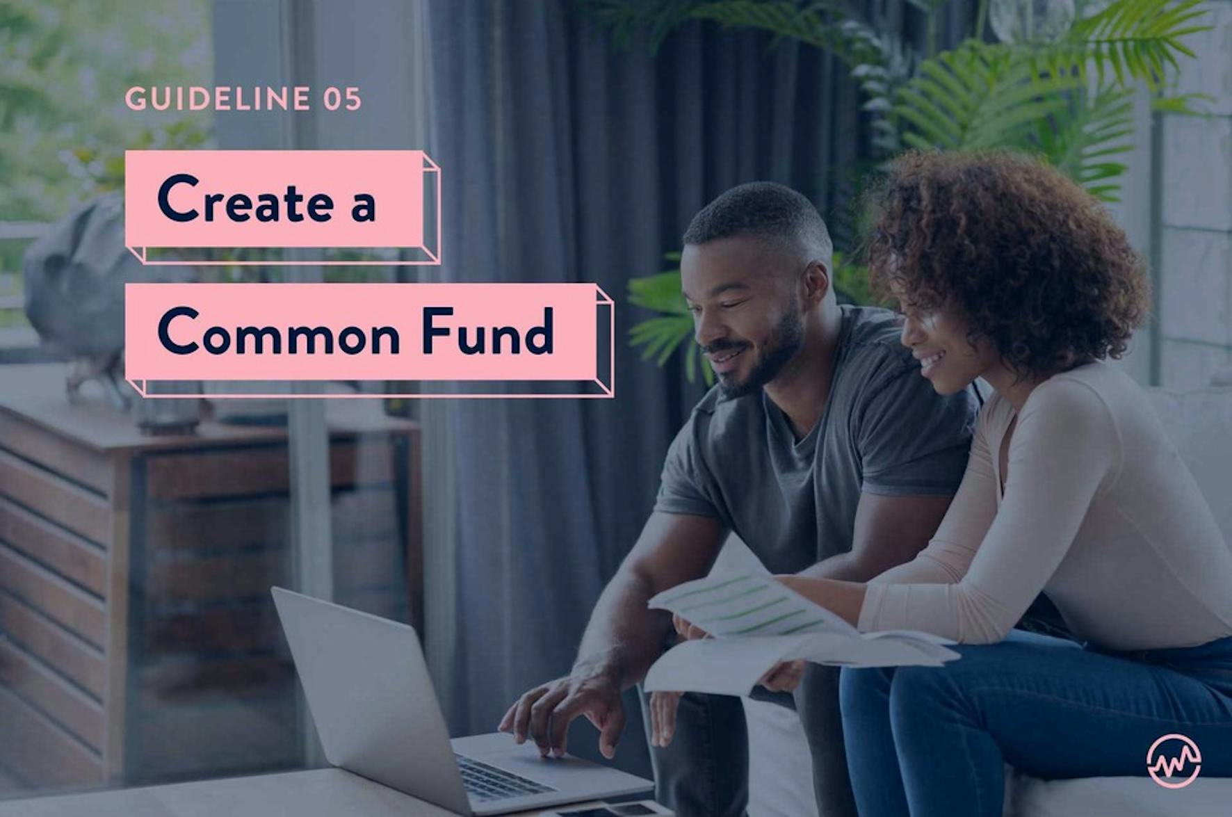 Two friends looking at a computer discussing creating a common fund for buying a house together