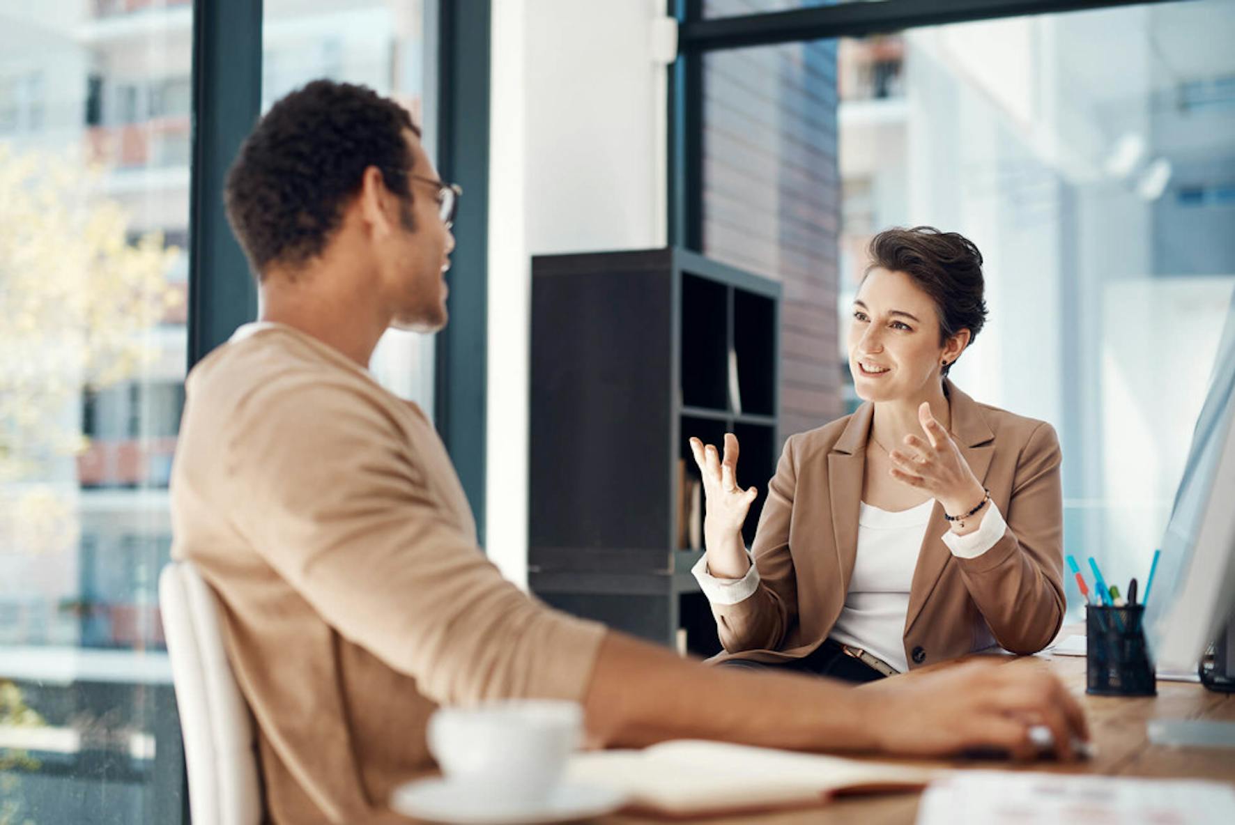 Two people discussing tradinglines to buying credit scores