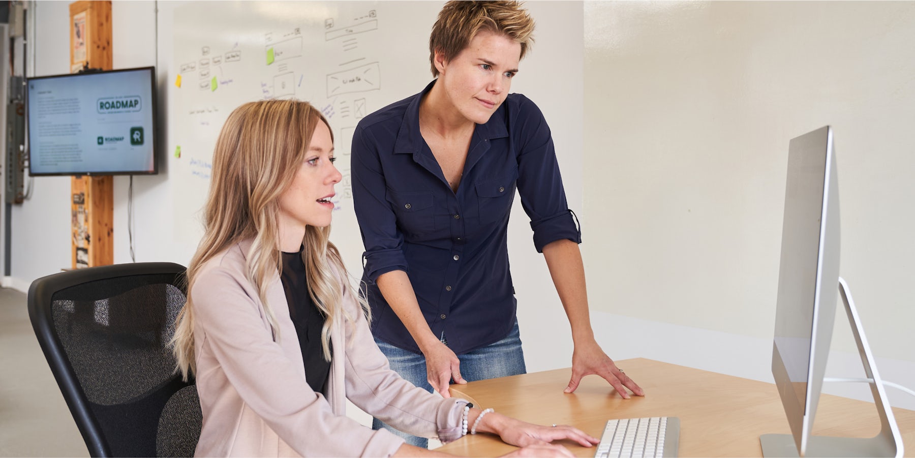Roadmap marketing agency employees working at computer