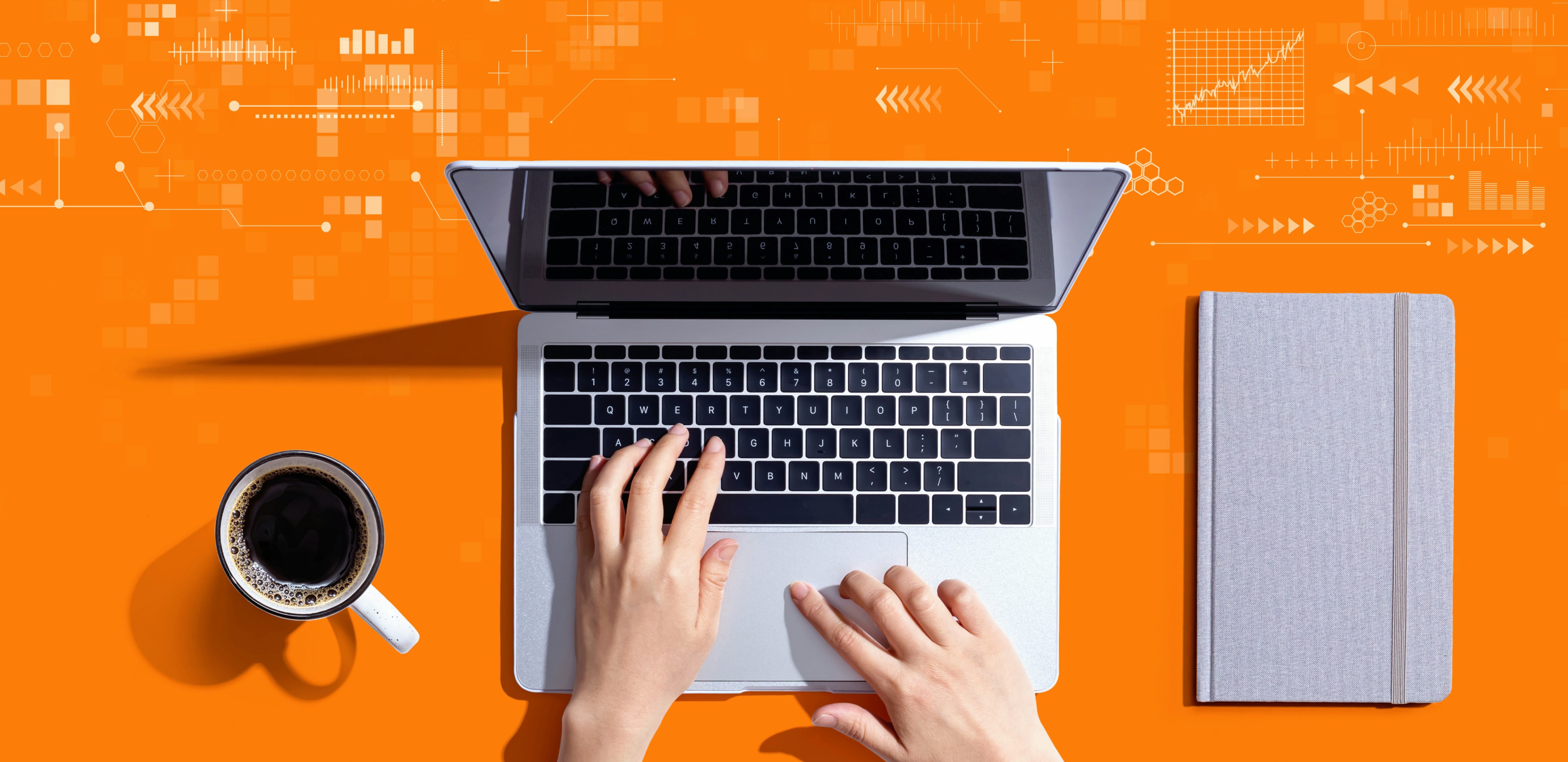 Image of a pair of hands on a laptop, with a coffee cup and notebook nearby, on an orange background