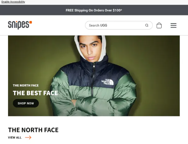 Snipes website homepage banner featuring a model in a North Face jacket