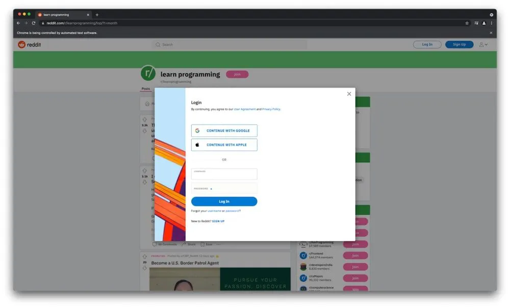 Reddit page with a login popup modal blocking the content, illustrating an obstacle when automating browsing