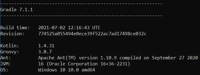 Terminal output showing Gradle version information along with JVM and OS details