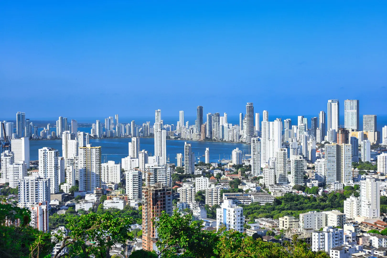 Cartagena de Indias with skyscrapers, the Caribbean Sea, and buildings along the coast