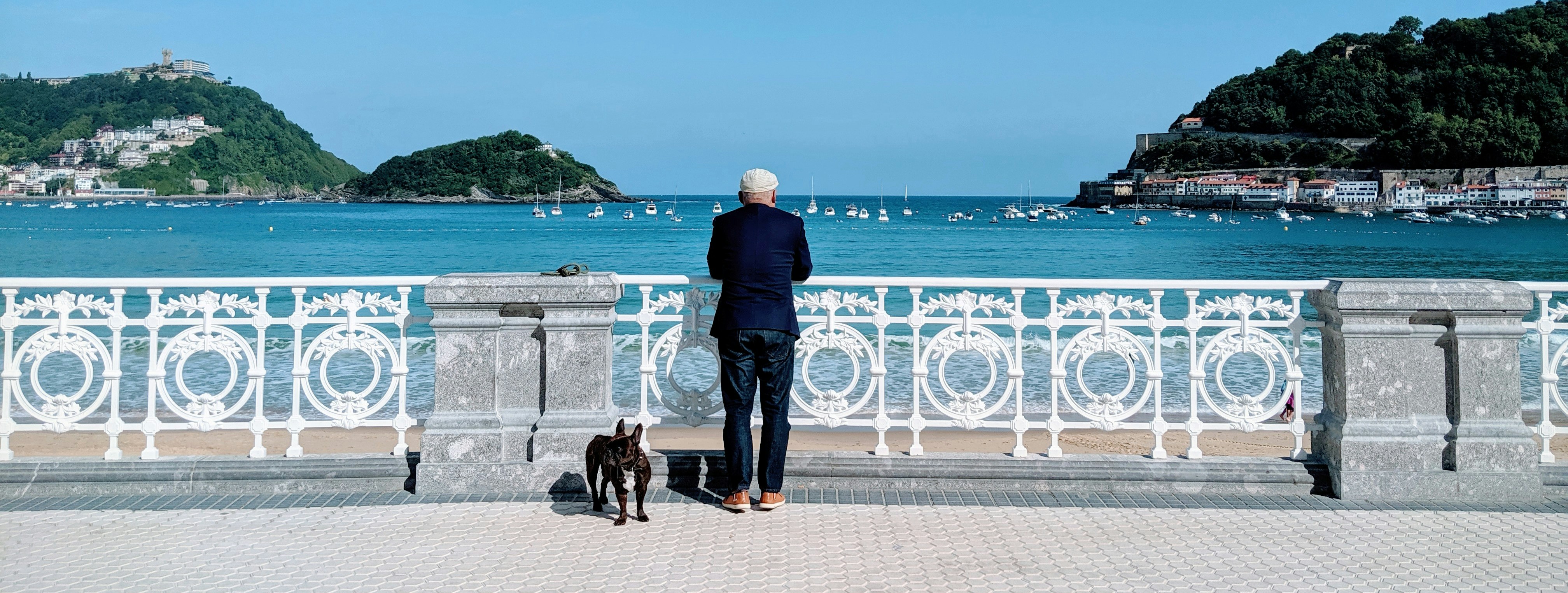 man standing near body of water