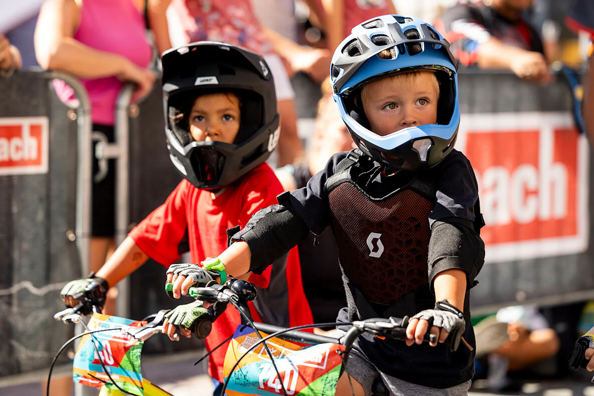 two kids biking in Saalbach at the world games mountain biking event