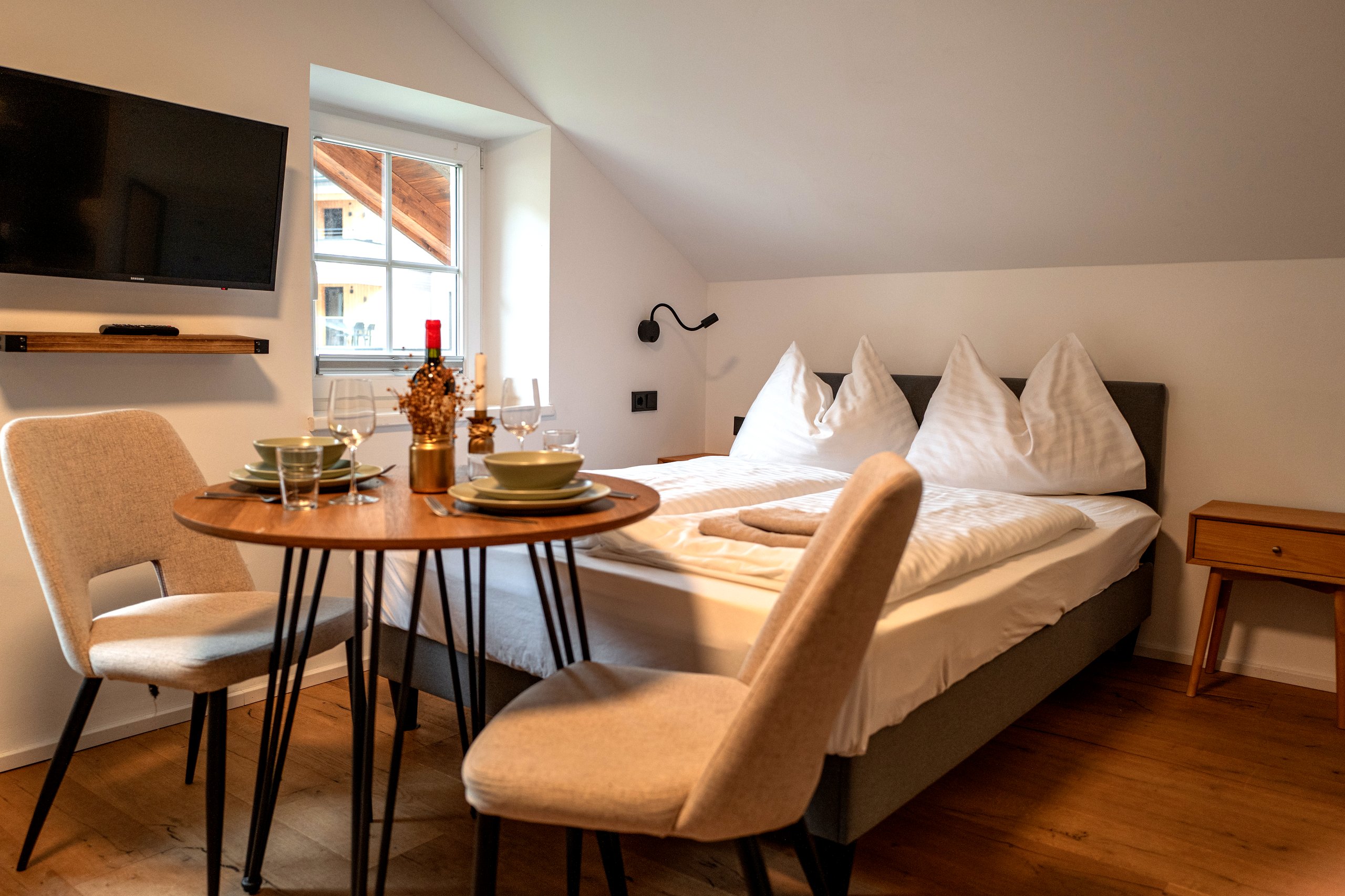 Studio apartment in dienten am hochkönig with comfortable bed and table, kitchen