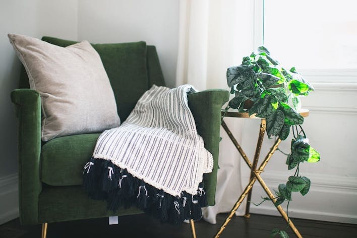 blanket draping over chair