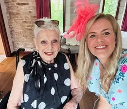 poppy selfie with elderly client at a wedding