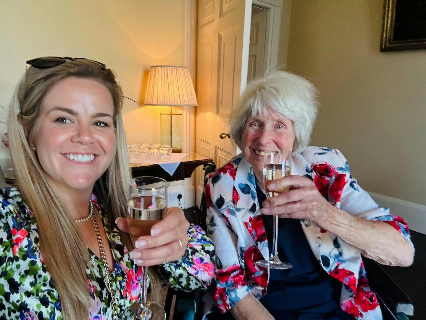 Poppy selfie with an elderly client at a wedding