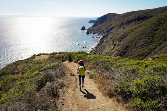 Woman hiking the Coastal Trail in the Marin Headlands 