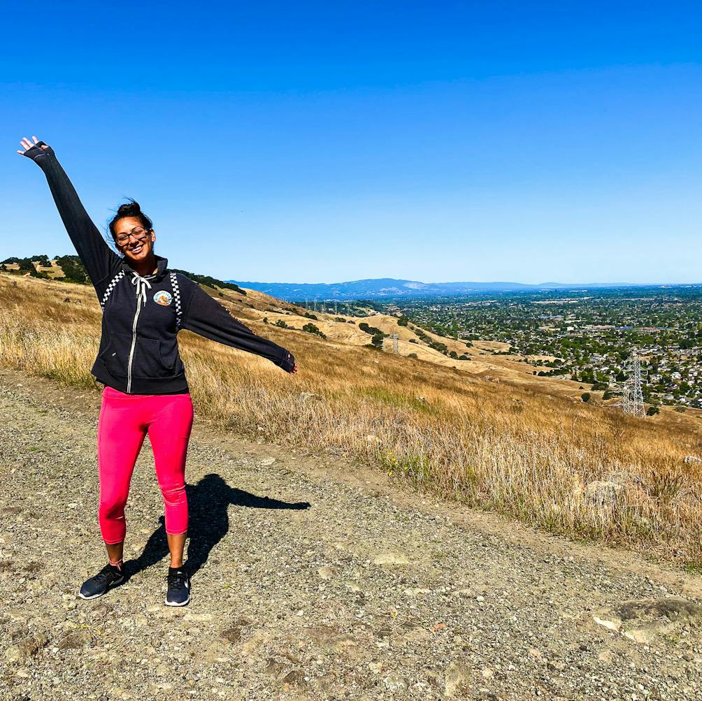 Hiker posing for the camera on a trail at Santa Teresa County Park in San Jose 