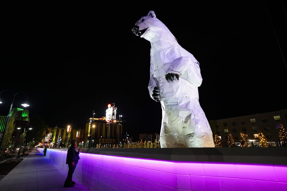 giant polar bear sculpture on neon line Reno