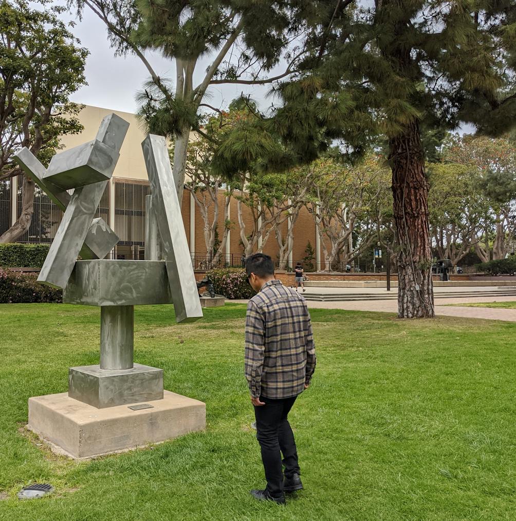 Person looking at an outdoor art installation at UCLA in Los Angeles