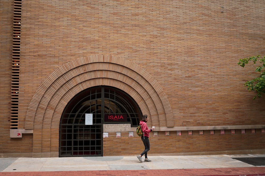 woman in front of Frank Lloyd Wright building on Barbary Coast San Francisco