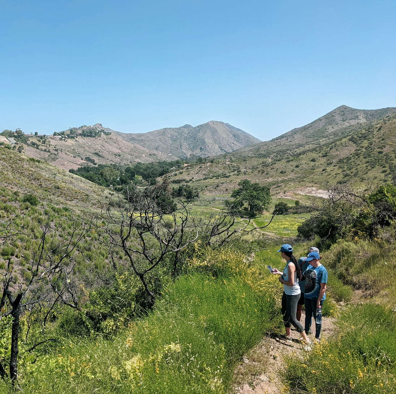 Hikers on a trail at Triunfo Creek Park near Thousand Oaks 