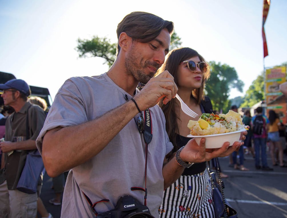 Man and woman enjoying food trucks in Reno