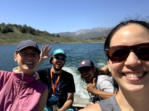 Group of friends taking a selfie on a boat on Lake Casitas in Ventura 