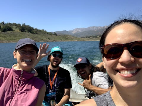Group of friends taking a selfie on a boat on Lake Casitas in Ventura