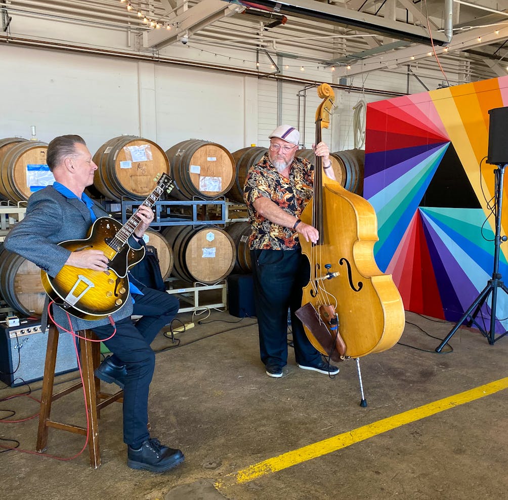 Two musicians at Riggers Loft in the historic Richmond Shipyard 