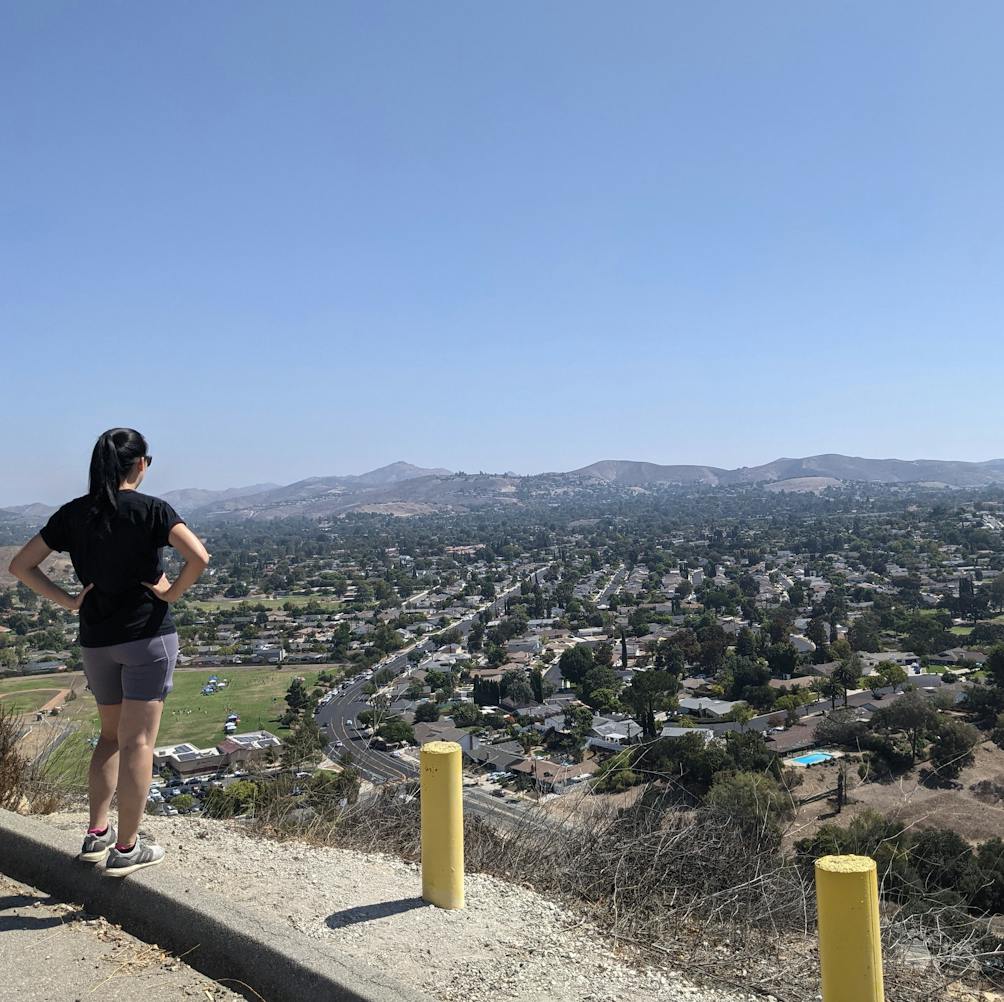 A woman looking out to the Santa Monica Mountains from the trail at Tarantula Hill in Thousand Oaks 