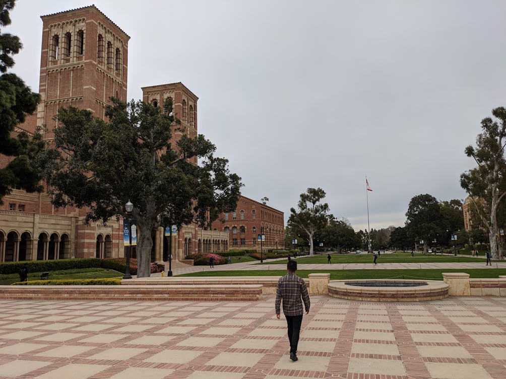 Person walking the grounds at UCLA campus in Los Angeles 