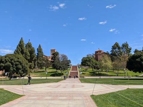 Person walking at campus grounds of UCLA in Los Angeles County 