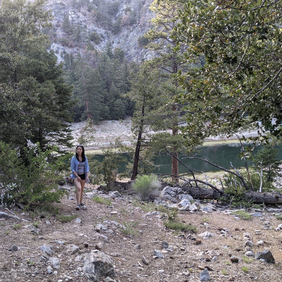 Woman at Crystal Lake in Crystal Lake Recreation Area in Los Angeles National Forest Southern California