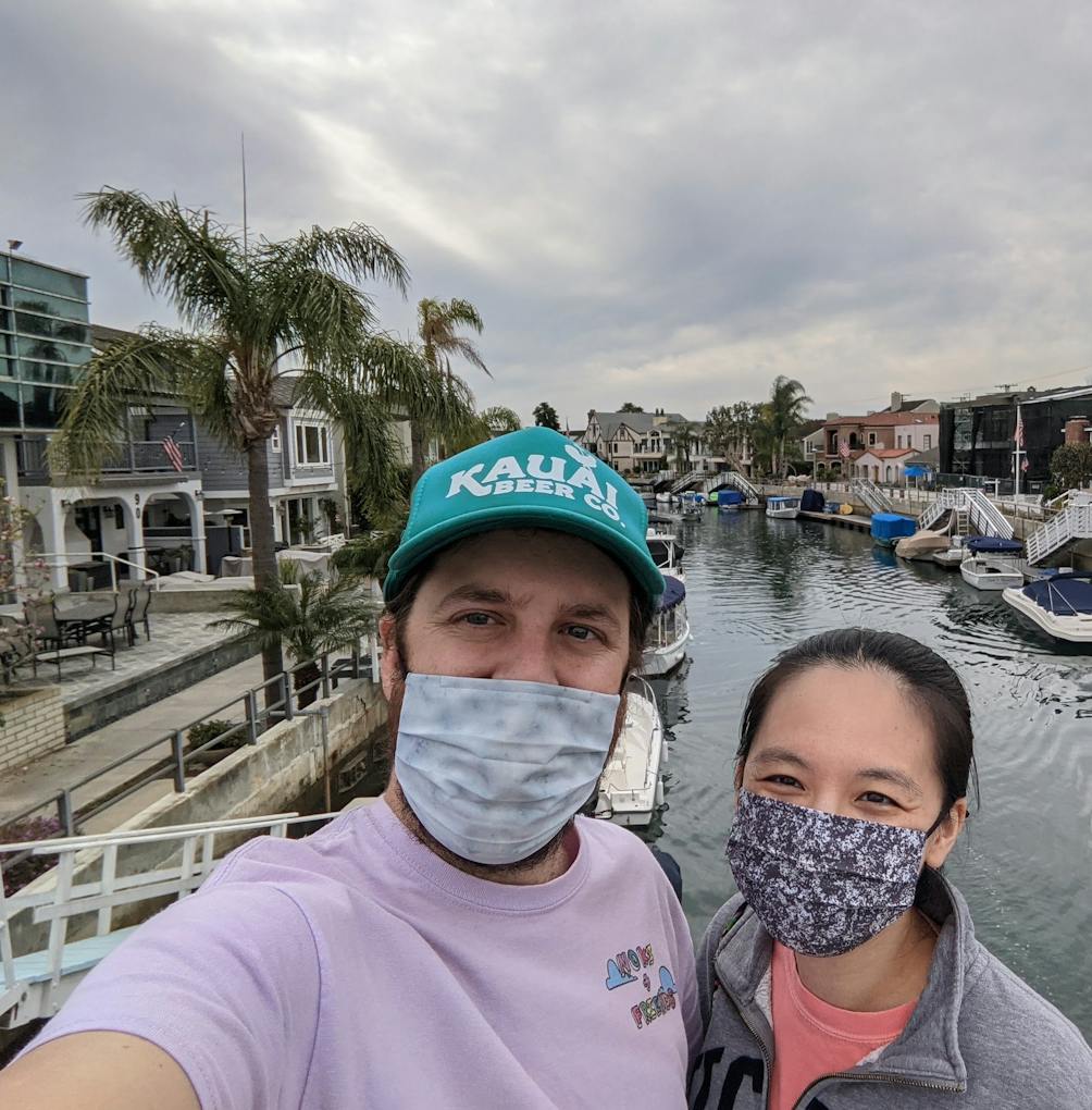 Couple taking a selfie at canals of Naples in Long Beach Los Angeles County 