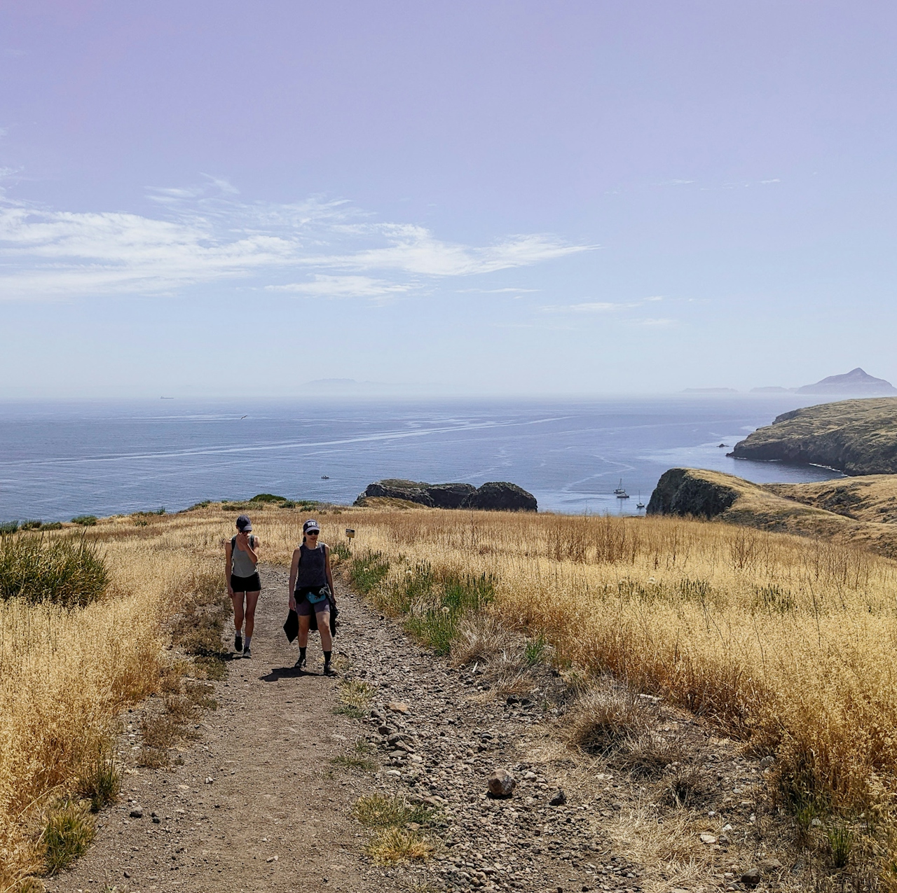 Two people hiking on Santa Cruz Island Channel Islands National Park 