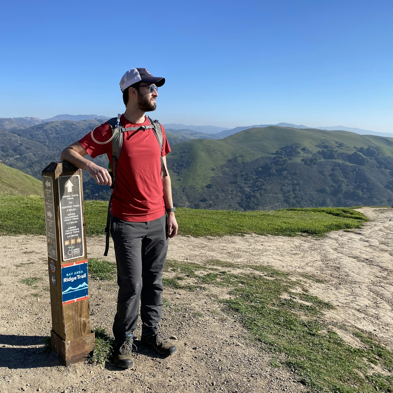 Person standing at the summit of Boccardo Loop Trail in Alum Park San Jose 