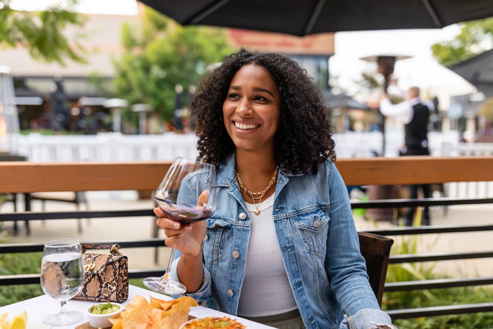 woman enjoining dining in Oxnard