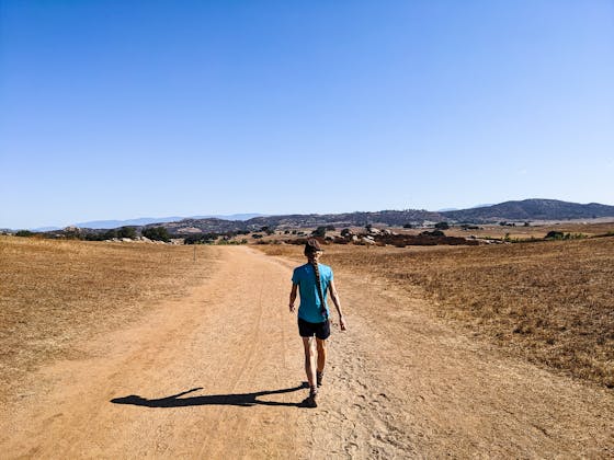 Hiker at Ramona Grasslands Preserve in northern San Diego County
