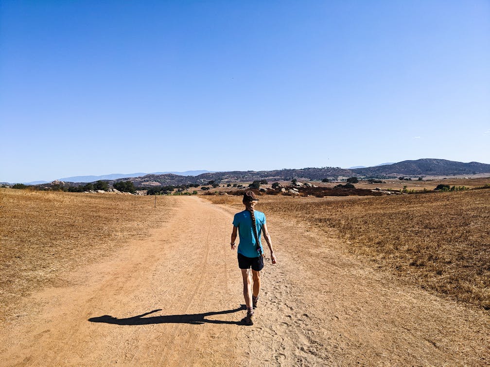 Hiker at Ramona Grasslands Preserve in northern San Diego County 