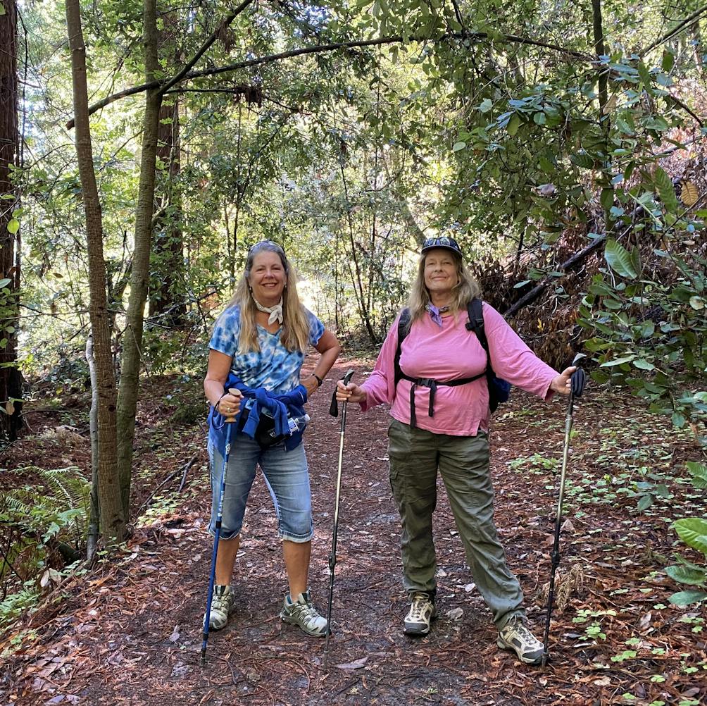 Two women hikers on the trail for Maple Falls in The Forest of Nisene Marks State Park