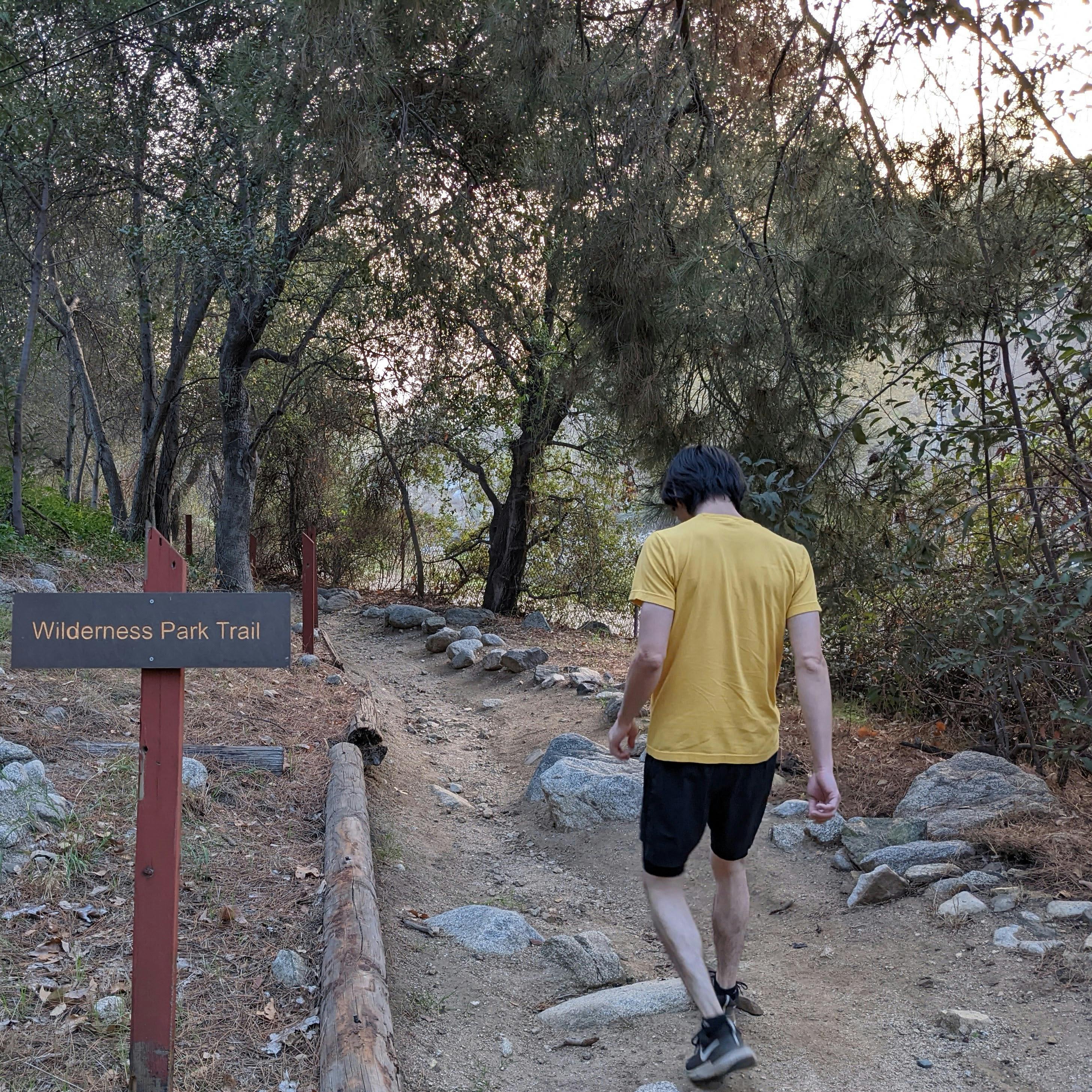 Hiker entering the hiking area at Arcadia Wilderness Park in Los Angeles County 